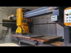 Integrated bridge cutting machine for slabs